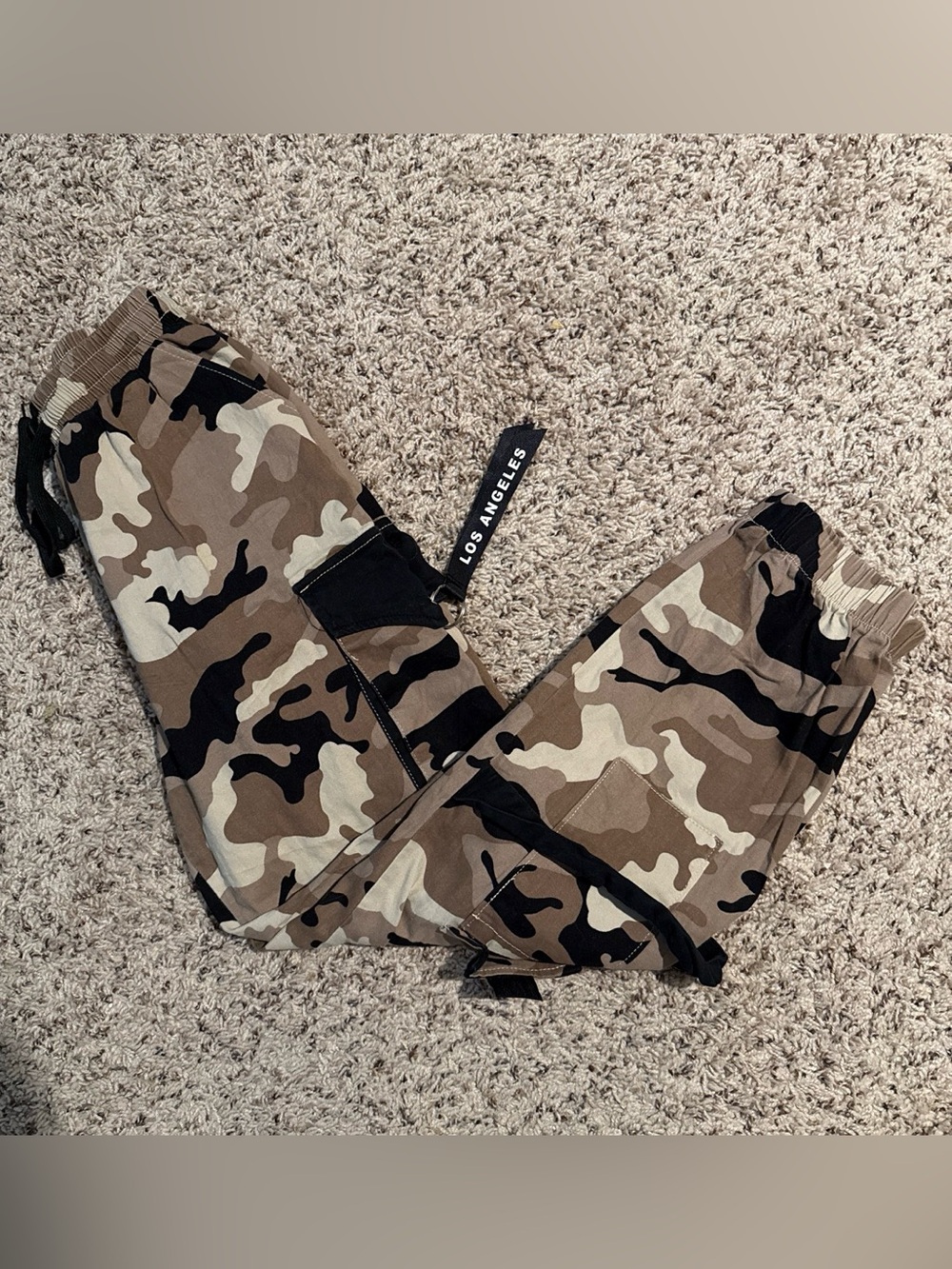 Rue 21 size small camo cargo pants with drawstring waist and lots of pockets